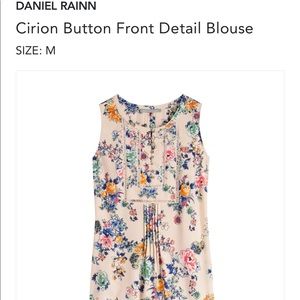 Floral, sleeveless blouse.